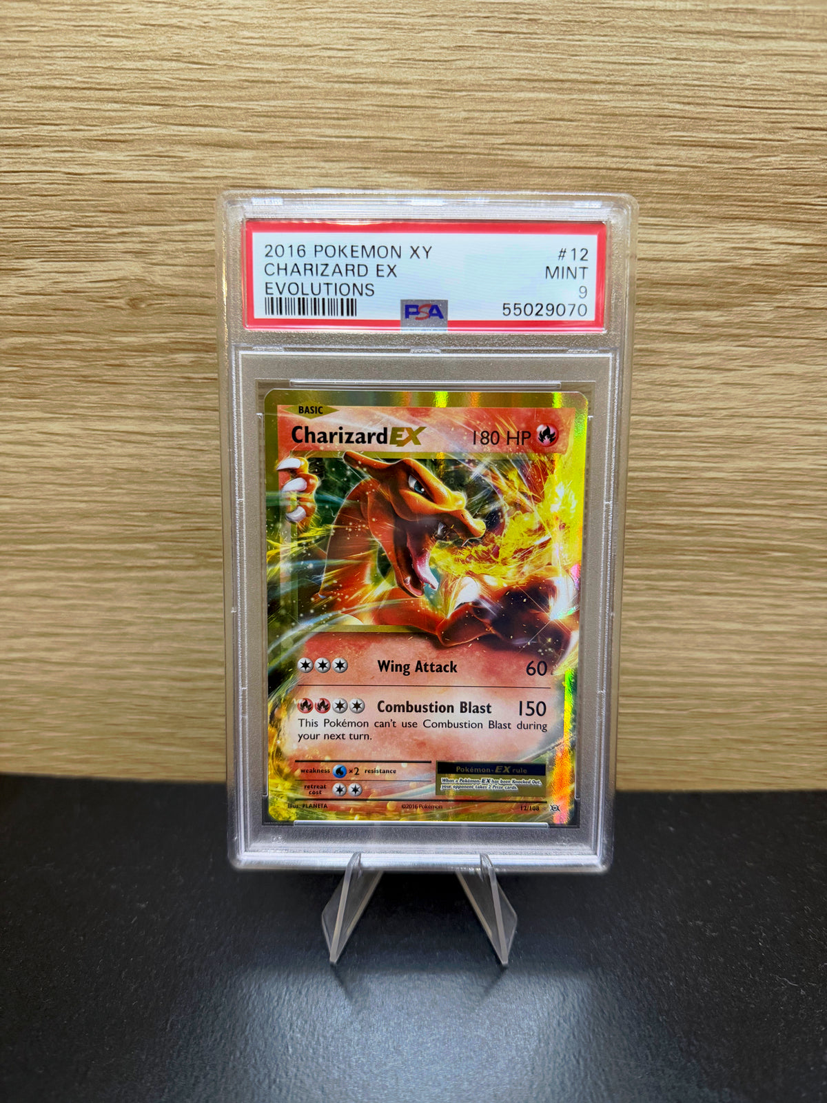 Charizard EX Evolutions #12 in PSA 9 slab