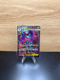English Mega Dragalge ex Pokémon card displayed on a stand