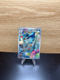 English Dewott Pokémon card displayed on a stand