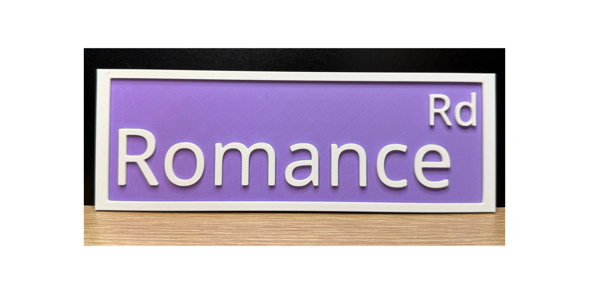 ROMANCE RD Sign